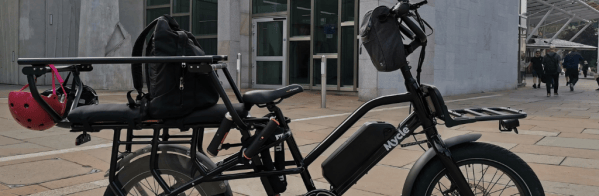 An electric bike outside the Scottish Parliament building