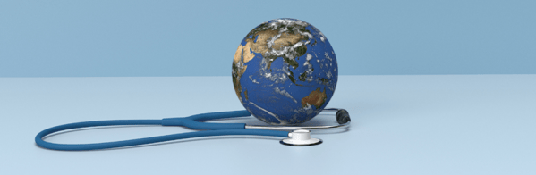 picture of a model of the earth surrounded by a stethoscope